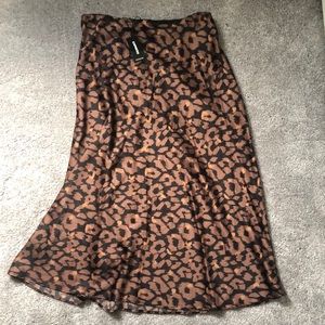 Brand new Express leopard print silk midi skirt